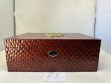 Auction item: CAB No.2 Hand Carved Rare  Double Bicep Bronze Arnold Schwarzenegger Humidor by Daniel Marshall signed in gold by Governor Arnold Schwarzenegger