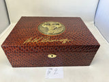 Auction item: CAB No.2 Hand Carved Rare  Double Bicep Bronze Arnold Schwarzenegger Humidor by Daniel Marshall signed in gold by Governor Arnold Schwarzenegger