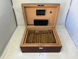 Auction item: CAB No.2 Hand Carved Rare  Double Bicep Bronze Arnold Schwarzenegger Humidor by Daniel Marshall signed in gold by Governor Arnold Schwarzenegger