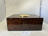 Auction item: CAB No. 11 Governor Seal Humidor by Daniel Marshall signed in gold by Governor Arnold Schwarzenegger