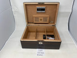 FACTORY FLOOR SALE #126 - AS IS -30125.2 MACASSAR EBONY 125 CIGAR HUMIDOR WITH LARGE SOLID SILVER AMERICAN COIN BY DANIEL MARSHALL