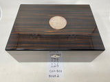 FACTORY FLOOR SALE #126 - AS IS -30125.2 MACASSAR EBONY 125 CIGAR HUMIDOR WITH LARGE SOLID SILVER AMERICAN COIN BY DANIEL MARSHALL